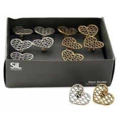 Upcycle your furniture with these chic silver and gold metallic door knobs. A chic heart design with decorative pattern.