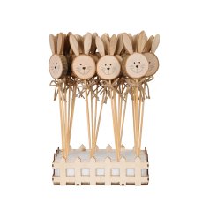 A charming natural wooden bunny stake with jute bow. 
