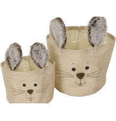 A set of 2 adorable bunny baskets. Each has a cute bunny face and faux fur ears.
