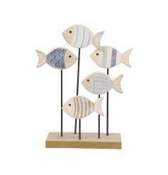 A chic ornament with natural wooden fish in varying blue and white patterns. 