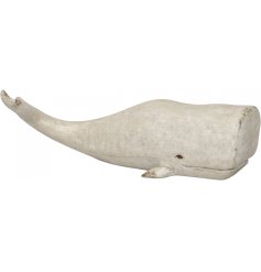 A unique and stylish wooden whale ornament with a white washed finish. 