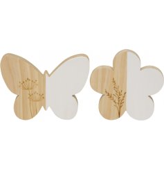 An assortment of 2 wooden butterfly and flower decorations, each with a pretty engraved floral design.