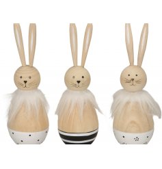 An assortment of 3 adorable wooden bunnies in polka dot, stripe and floral designs. Each has a chic faux fur collar. 