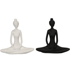 An assortment of 2 elegant ladies sitting in a yoga pose. A calming and contemporary interior accessory.