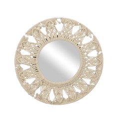 A beautifully intricate macrame mirror in cream. An on trend boho style accessory.