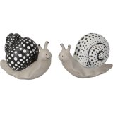 An assortment of 2 black and white polka dot snail ornaments. A cute and unique garden accessory.
