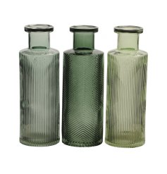 An assortment of 2 stylish glass vases in an assortment of green colours.