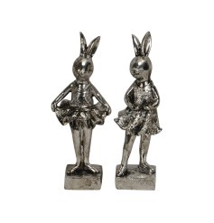 An assortment of 2 vintage style silver bunny ornaments in dancing poses.