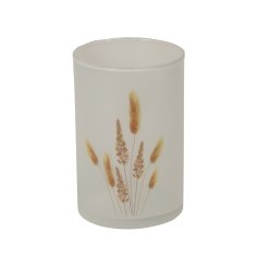 A frosted glass candle holder with a chic pampas grass decal. 