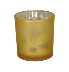 A beautiful bee themed glass candle holder in a striking smoked yellow finish. 