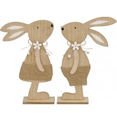 An assortment of 2 charming wooden bunny decorations. Each has a white daisy charm and beaded jute bow. 