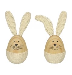 An assortment of 2 wooden bunny eggs. Each with woven cream ears and cute painted faces.