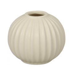 A classic ribbed vase in cream. A stylish vessel for the home.