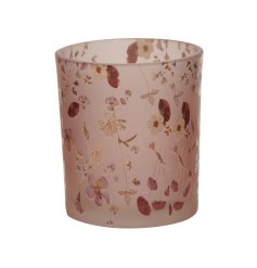 A pretty pink glass t-light holder decorated with an abundance of delicate cascading flowers 