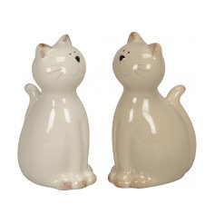 An assortment of 2 beautifully glazed cat ornaments in natural cream colours.