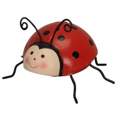 A cute and colourful iron lady bird decoration for the garden. 