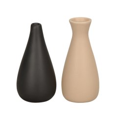 An assortment of 2 black and cream contemporary vases. An artistic and stylish addition to the home.
