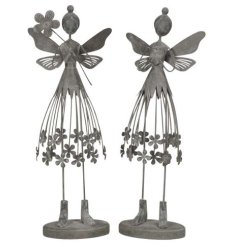 An assortment of 2 rustic metal flower fairies. An enchanting figure with beautiful floral details.