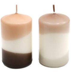 An assortment of 2 stylish pillar candles with a natural abstract design.