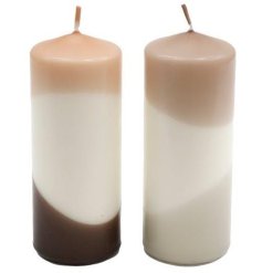 An assortment of 2 natural coloured pillar candles with a unique abstract design. A cool and contemporary interior item.