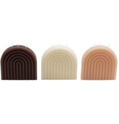 Brown, cream and peach rainbow candles, each with 3 wicks. A chic and contemporary interior accessory.