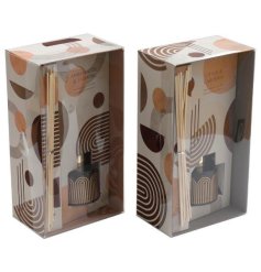 An assortment of 2 beautifully scented reed diffusers, each with an abstract rainbow design and stylish gift packaging.