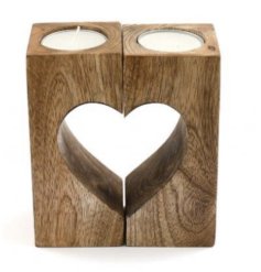 A rustic wooden t-light holder with a heart shaped cut out feature. A unique pair of candle holders