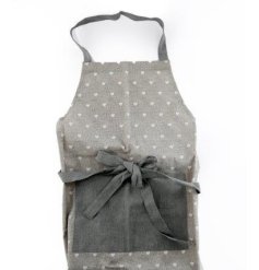 A stylish grey apron decorated with a pretty white hearts design. Complete with handy front pocket.