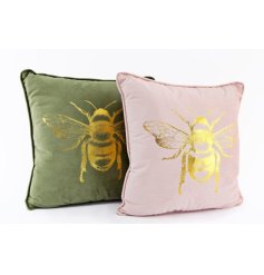 An assortment of 2 plump cushions in pretty green and pink hues. Complete with a gold bee motif.