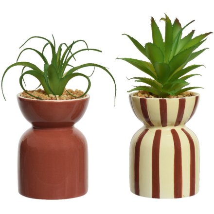 An assortment of 2 super stylish ceramic pots in stripe and plain brick colours. Complete with artificial plants.