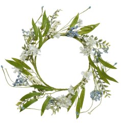 A pretty, whimsical wreath with blue and white berries.