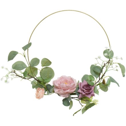 A beautiful wire wreath adorned with foliage and vintage roses in pink hues. A must have artificial wreath for the home.