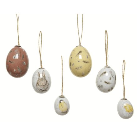 A charming collection of multi-sized egg decorations, each with a speckled design and glossy finish.