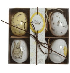 A gift box filled with a gorgeous mix of speckled eggs including feather and animal designs. Complete with jute hangers.
