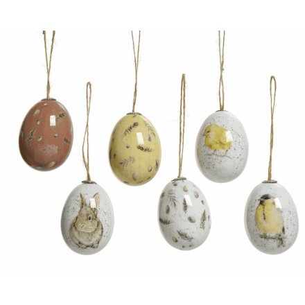 An assortment of 6 charming eggs decorated in feathers and animals designs. Complete with jute hangers.