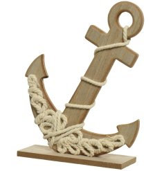 A charming wooden anchor wrapped in cotton rope. A must have coastal themed decoration for the home.