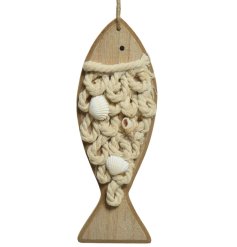 A wooden fish hanger with cotton rope and shells. A unique beach themed interior accessory.