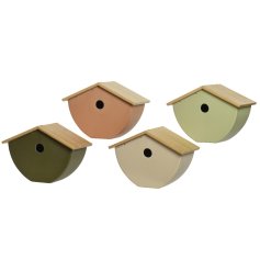 An assortment of 4 stylish eco friendly bird houses in a mix of earthy tones. 