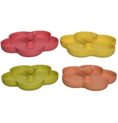 An assortment of 4 richly coloured bamboo bird feeders in the shape of a flower. Complete with a bird figure. 