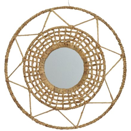 A beautiful mirror woven from water hyacinth, a plant that grows in abundance in the waterways of Vietnam.