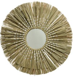 An on trend mirror made from sea grass. Woven with white rope. 