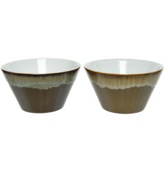 An assortment of 2 stoneware bowls. Handmade with a reactive glaze in chic brown and beige colours. 