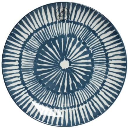 A decorative breakfast plate with a tie dye inspired glossy pattern. 