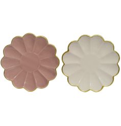 An assortment of 2 pink and cream floral trinket dishes, each with an attractive gold rim. 