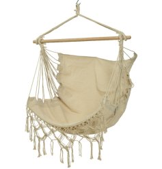 Relax in style with this bohemian style hammock chair in cream. Details include blonde wood and macrame tassels. 