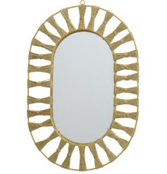 A bohemian style oval shaped mirror with sunshine effect rope detailing. 
