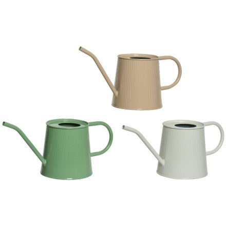 A mix of 3 stylish zinc watering cans in green, cream and white colours. Each is slightly ribbed with a long spout. 