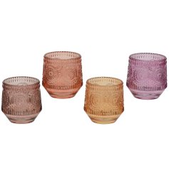 A mix of 4 beautifully detailed floral glass candle holders in rich and vibrant colours. 