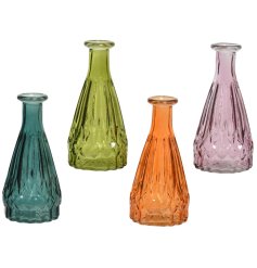 An assortment of 4 bottle neck vases in rich jewel colours including orange, green and purple.
