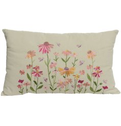 A stunning soft velvety cushion with a beautiful embroidered image of a wild flower meadow.
